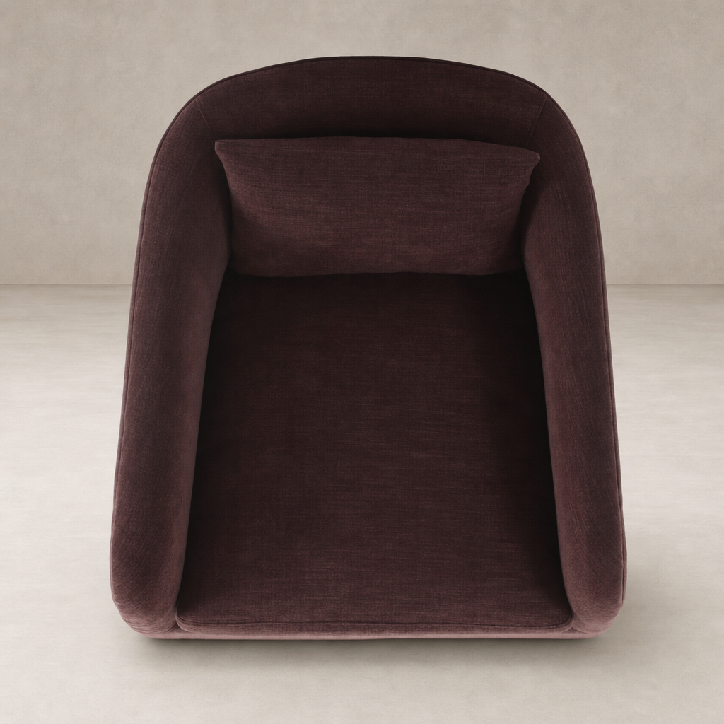 Magnolia Swivel Chair in Laughlin Plum with plush, curved design and removable cushion.