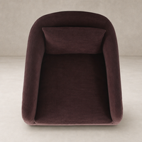 Magnolia Swivel Chair in Laughlin Plum with plush, curved design and removable cushion.