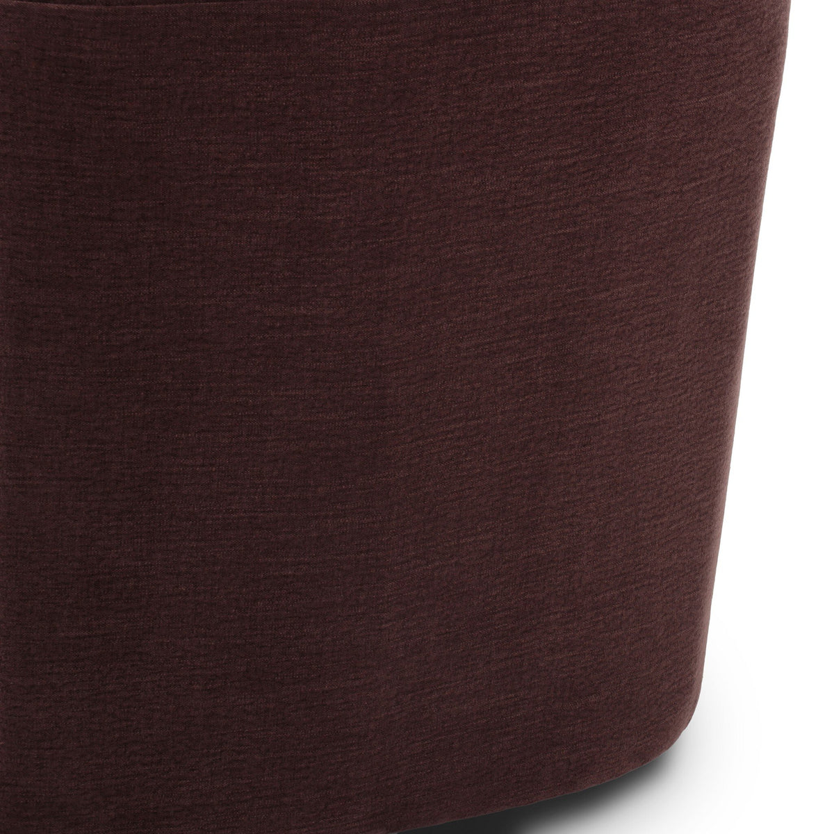 Close-up of the Magnolia Swivel Chair in Laughlin Plum fabric showcasing its soft texture.