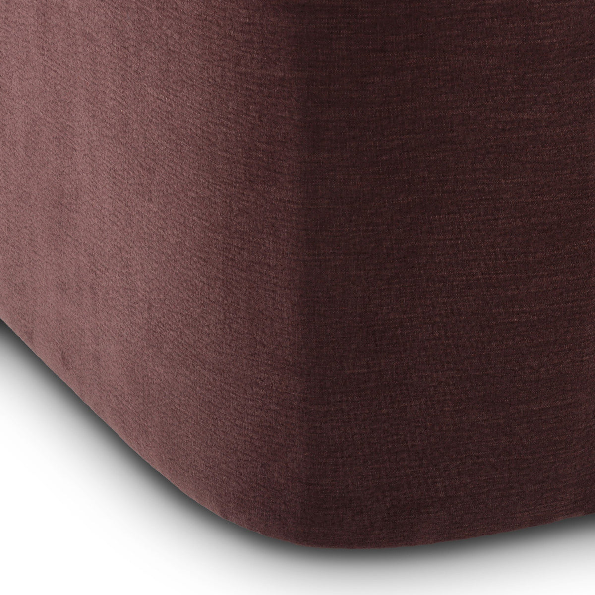 Magnolia Swivel Chair in Laughlin Plum featuring a smooth, rich textured fabric.