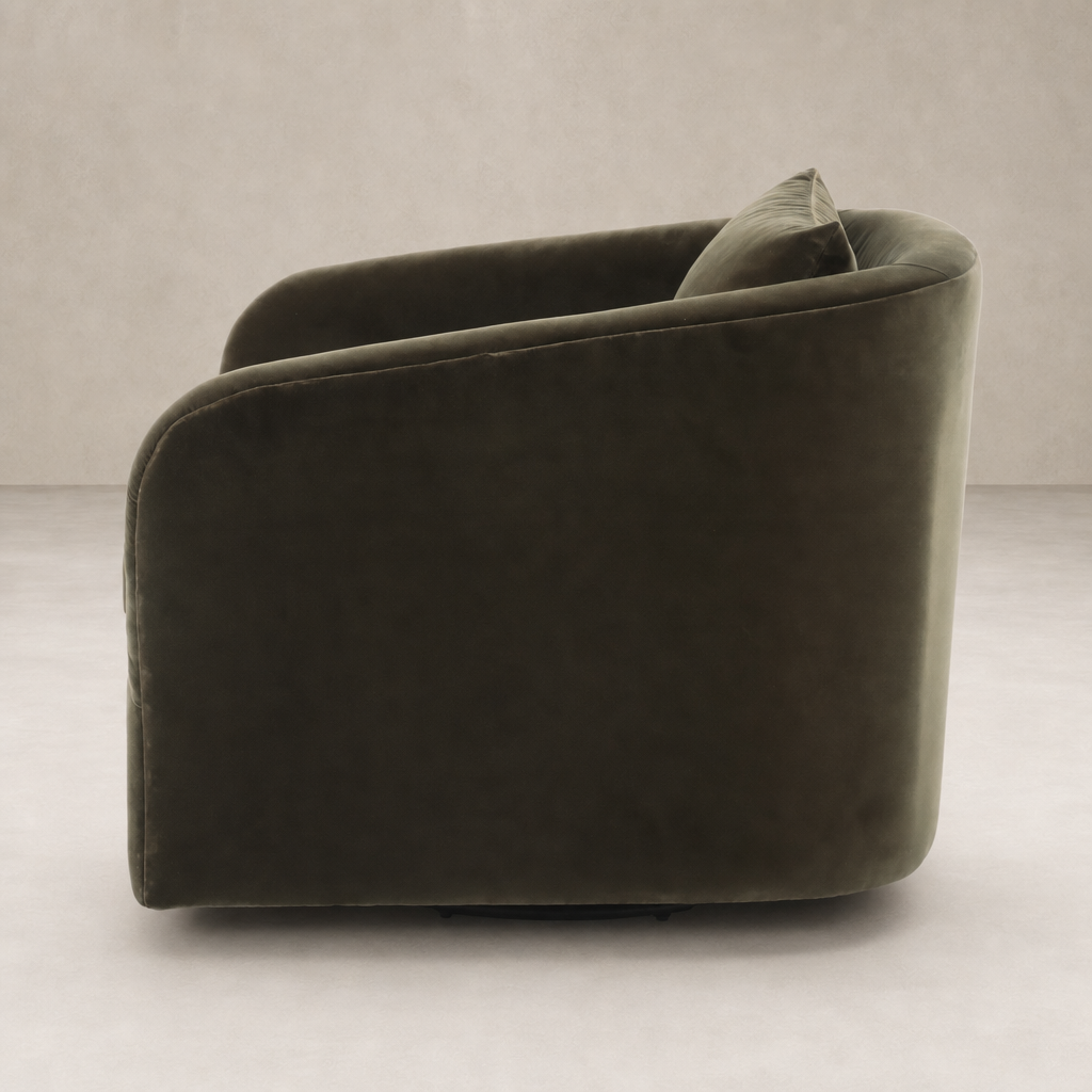 Magnolia Swivel Chair in Surrey Olive showcasing plush fabric and curved silhouette.
