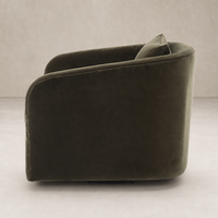 Magnolia Swivel Chair in Surrey Olive showcasing plush fabric and curved silhouette.