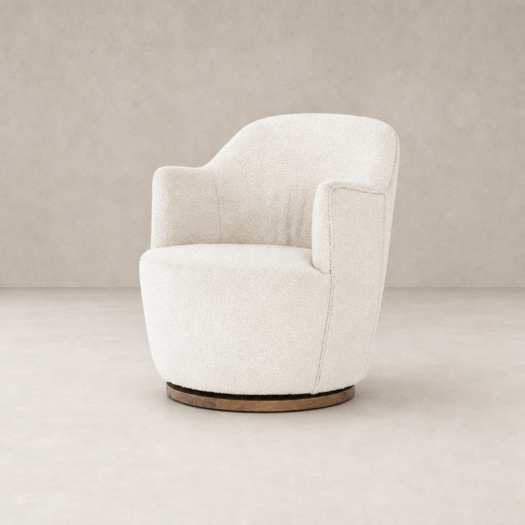 Comfortable Soliel swivel chair in Knoll Natural upholstery with rounded design.