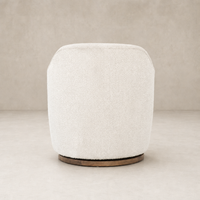 Soliel Swivel Chair in Knoll Natural with soft texture and rounded design.