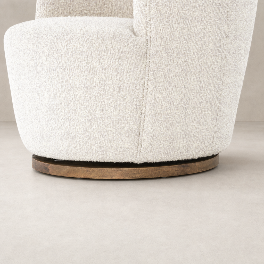 Soliel Swivel Chair in Knoll Natural featuring a textured upholstery and smooth wooden base.