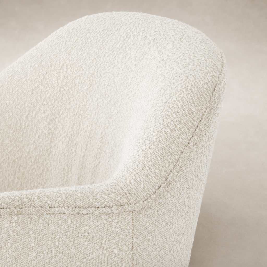 Close-up of the textured Knoll Natural fabric on the Soliel Swivel Chair.