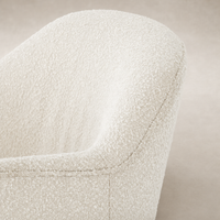 Close-up of the textured Knoll Natural fabric on the Soliel Swivel Chair.