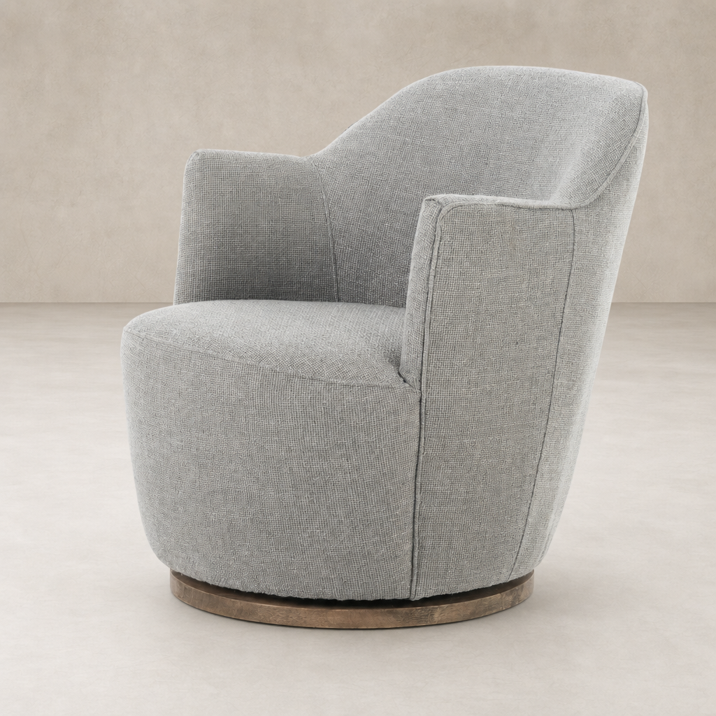 Stylish Soliel Swivel Chair in Gibson Silver featuring a rounded shape and comfy arms.
