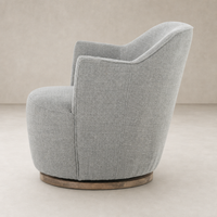Soliel Swivel Chair in Gibson Silver featuring a rounded design and textured fabric.