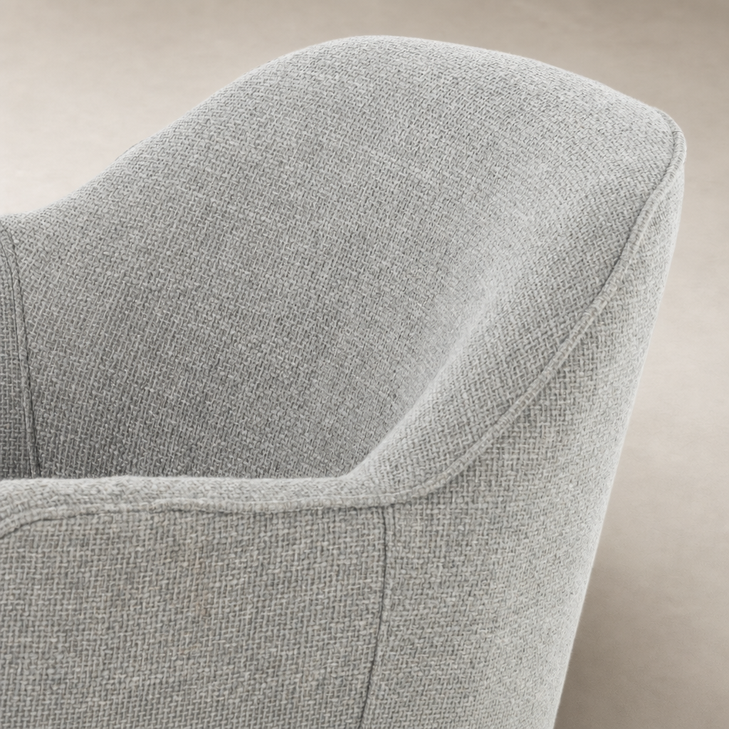 Close-up of the textured fabric on the Soliel Swivel Chair in Gibson Silver.