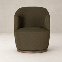 Soliel Swivel Chair in Fiqa Boucle Olive with rounded shape and wooden base.
