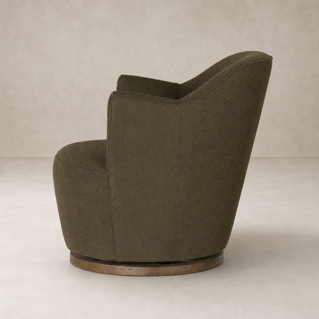 Soliel Swivel Chair in Fiqa Boucle Olive with a sleek, curved design and wooden base.