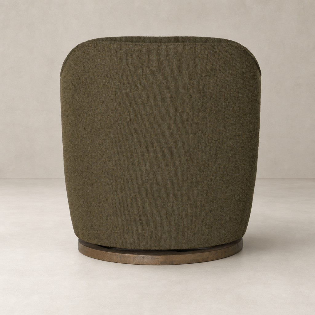 Soliel Swivel Chair in Fiqa Boucle Olive featuring a rounded back design and wooden base.