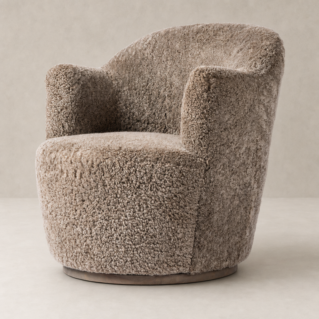 Taupe shearling Soliel swivel chair featuring a rounded shape and plush texture.