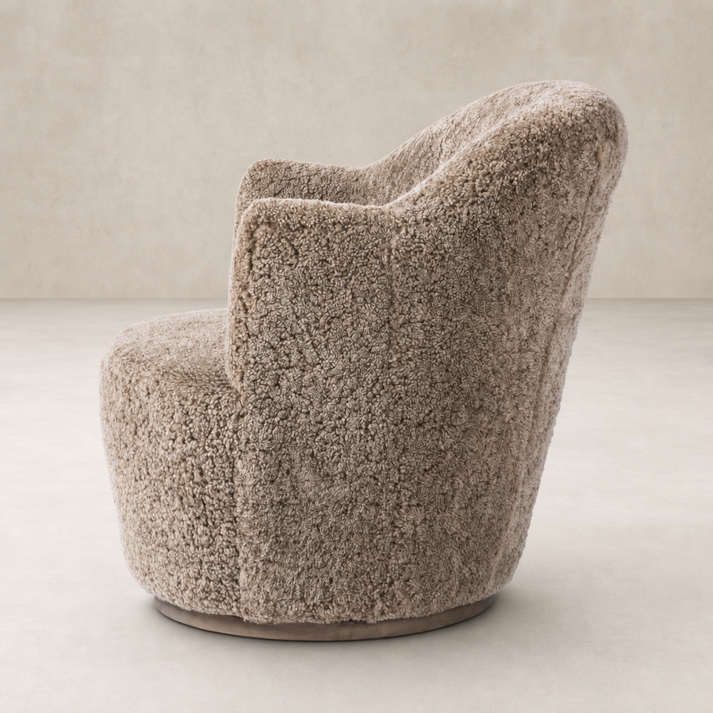 Taupe shearling Soliel swivel chair featuring a rounded, plush design for comfort.