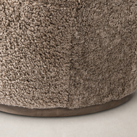 Taupe shearling texture of the Soliel Swivel Chair's soft upholstery close-up.