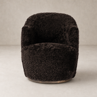 Cocoa shearling Soliel Swivel Chair with plush texture and rounded design.