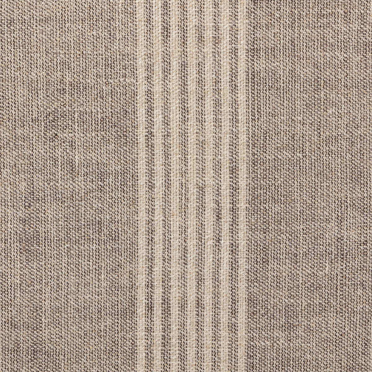 Detail of the Bilbury Large Round Ottoman showcasing its textured fabric in neutral tones.
