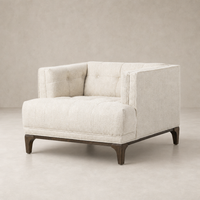 Murano Chair in Kerbey Taupe featuring tufted cushions and sleek wooden legs.