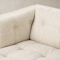 Murano Chair in Kerbey Taupe featuring soft, textured upholstery and tufted details.