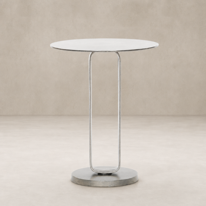 Rowan End Table features a sleek round top and a modern metal base.
