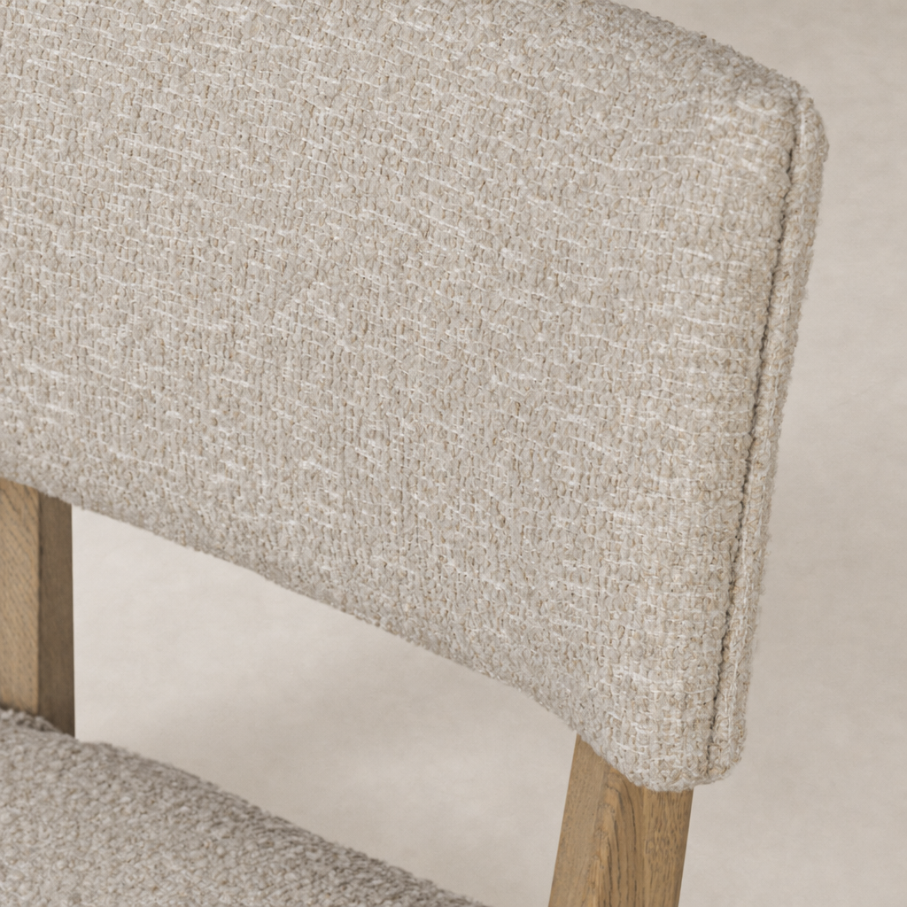 Close-up of the Orson Dining Chair in Mortensen Linen showcasing its textured upholstery.