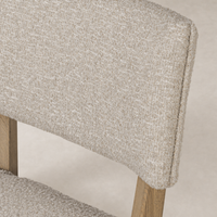 Close-up of the Orson Dining Chair in Mortensen Linen showcasing its textured upholstery.