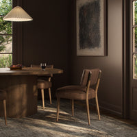 Orson Dining Chair in Palermo Cigar color, featuring a sleek design in a cozy dining setting.