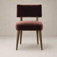 Orson Dining Chair in Surrey Plum with a sleek, modern design and wooden legs.