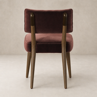 Orson Dining Chair in Surrey Plum featuring plush upholstery and tapered wooden legs.
