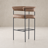 Banyan Bar + Counter Stool in Chaps Saddle features sleek design and minimalist metal legs.