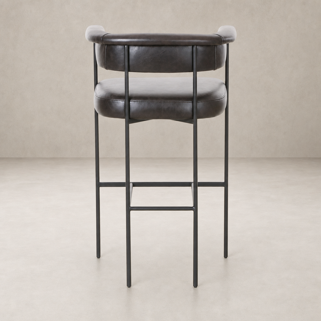 Banyan Bar + Counter Stool in Sonoma Black featuring a sleek curved back and sturdy metal legs.