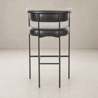 Banyan Bar + Counter Stool in Sonoma Black featuring a sleek curved back and sturdy metal legs.