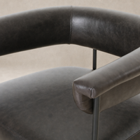Banyan Bar + Counter Stool in Sonoma Black showcasing sleek leather upholstery and modern design.