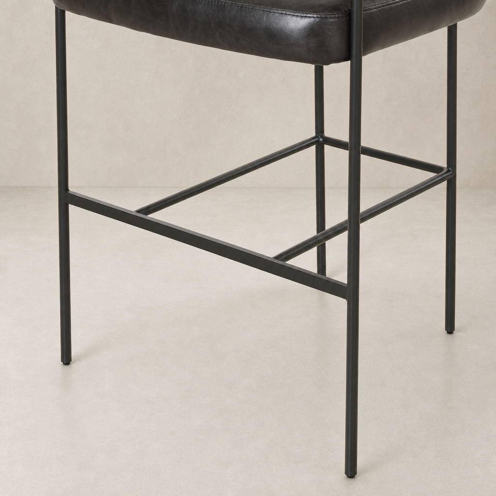 Banyan Bar + Counter Stool in Sonoma Black with sleek metal frame and cushioned seat.