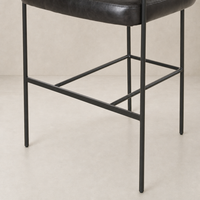 Banyan Bar + Counter Stool in Sonoma Black with sleek metal frame and cushioned seat.