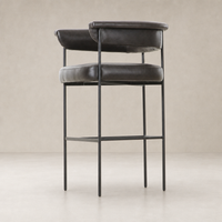 Sleek Banyan Bar + Counter Stool in Sonoma Black with minimalist metal legs.