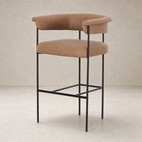 Banyan Bar + Counter Stool in Maestro Camel with sleek black metal legs and soft backrest.