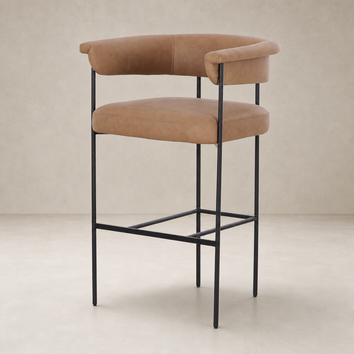 Banyan Bar + Counter Stool in Maestro Camel with sleek black metal legs and soft backrest.