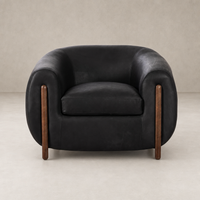 Stylish Clover Chair in heirloom black with curved design and wooden legs.