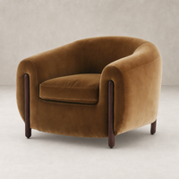 Clover Chair in Surrey Ochre with soft velvet upholstery and a modern rounded design.
