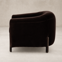Stylish Clover Chair in Surrey Cocoa with a curved design and wooden legs.