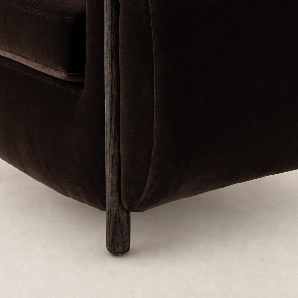 Clover Chair in Surrey Cocoa featuring soft velvet upholstery and sleek wooden legs.