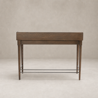 Quince Desk in dark toasted oak with sleek lines and elegant tapered legs.