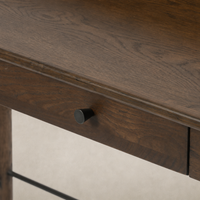 Quince Desk in Dark Toasted Oak featuring a sleek finish and modern pull knob.