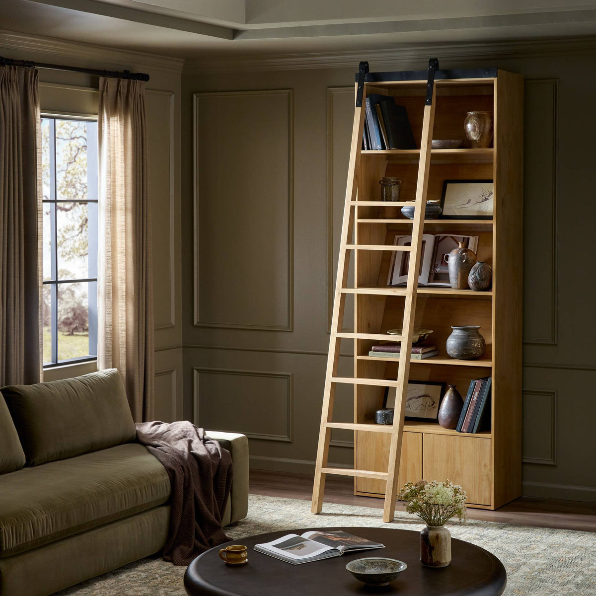 Tahoe Bookshelf in Smoked Pine with a ladder, featuring open shelves and wooden finish.
