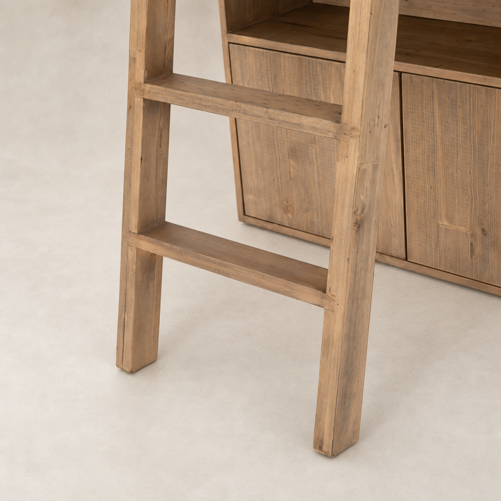 Detailed view of the Tahoe Bookshelf in smoked pine, showcasing sturdy ladder-style shelves.