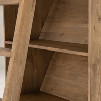 Tahoe Bookshelf in smoked pine with a slanted shelf design and natural finish.