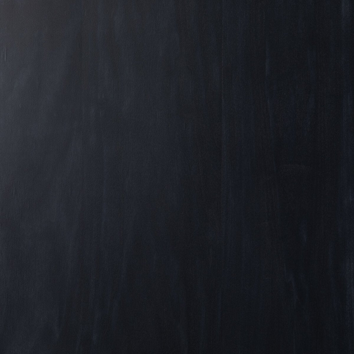 Close-up of the Ellis Bookcase showcasing its sleek black finish and minimalist design.