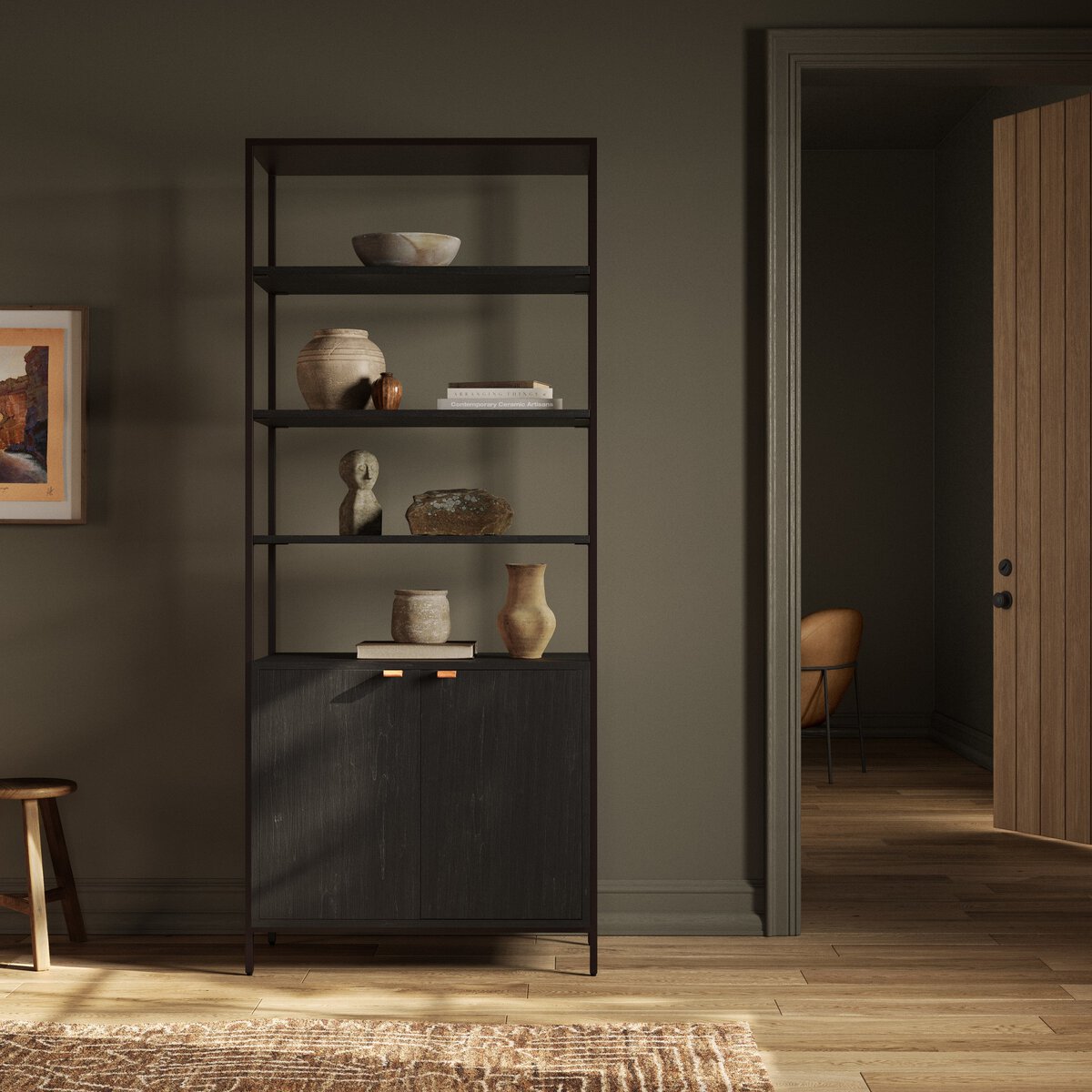 Front view of the Ellis Bookcase featuring open shelves and a sleek, dark wood cabinet.